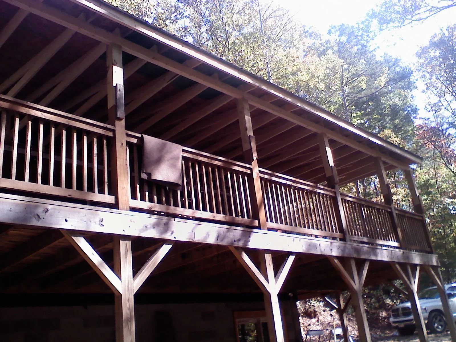 Timber framing under a new elevated porch and deck — Roof Leak Repair in La Crosse by Roofing Brothers